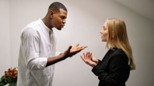calm woman angry man conversation